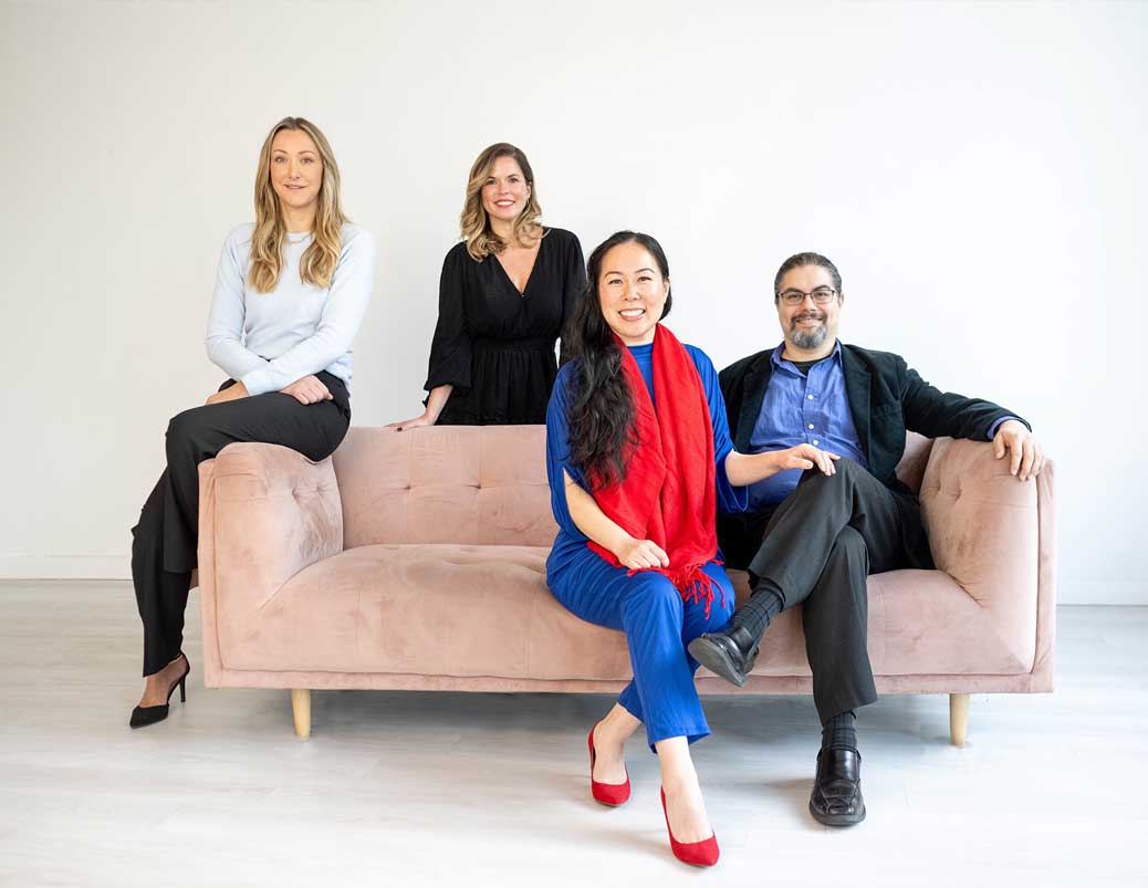 The Aspen Wellness Institute team seated together in a bright studio